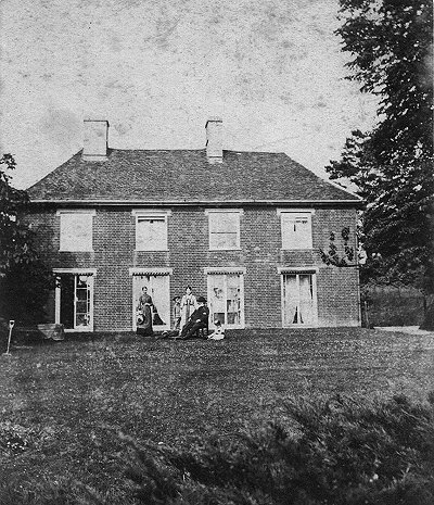 The Old Rectory c.1880 with the Reverend Fiske and family